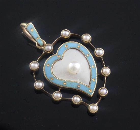 An Edwardian gold, enamel and seed pearl wavy heart shaped pendant, 1.25in.